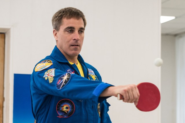 jsc2020e016965 (April 1, 2020) - At the Cosmonaut Hotel crew quarters in Baikonur, Kazakhstan, Expedition 63 crewmember Chris Cassidy of NASA plays a game of ping-pong April 1. Cassidy and Ivan Vagner and Anatoly Ivanishin of Roscosmos will launch April 9 on the Soyuz MS-16 spacecraft from the Baikonur Cosmodrome in Kazakhstan for a six-and-a-half month mission on the International Space Station.