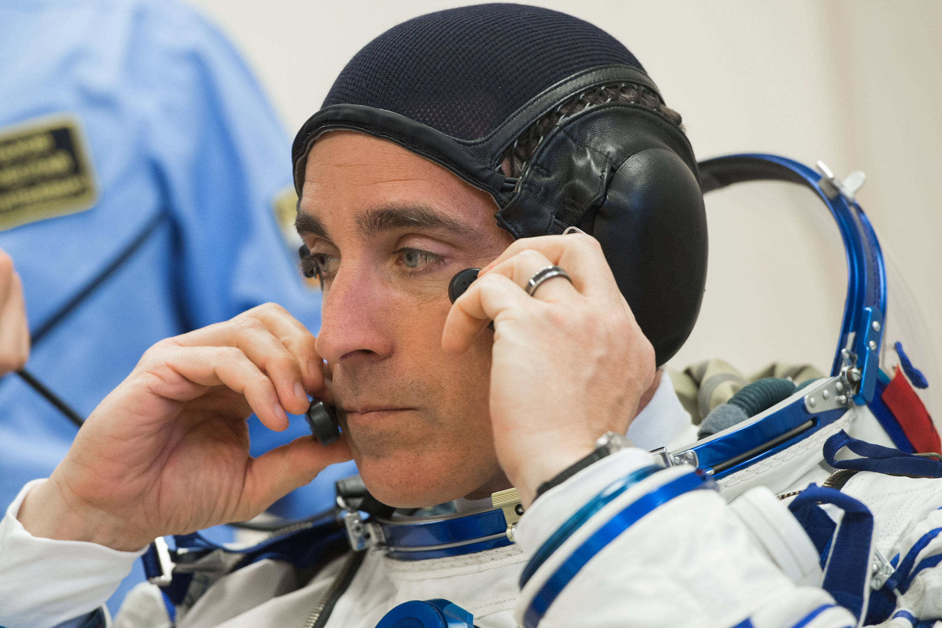 At the Baikonur Cosmodrome in Kazakhstan, Expedition 63 crewmember Chris Cassidy of NASA suits up March 25 for pre-launch training activities. Cassidy and Anatoly Ivanishin and Ivan Vagner of Roscosmos will launch April 9 on the Soyuz MS-16 spacecraft from Baikonur for a six-and-a-half month mission on the International Space Station. Credit: Andrey Shelepin/Gagarin Cosmonaut Training Center.