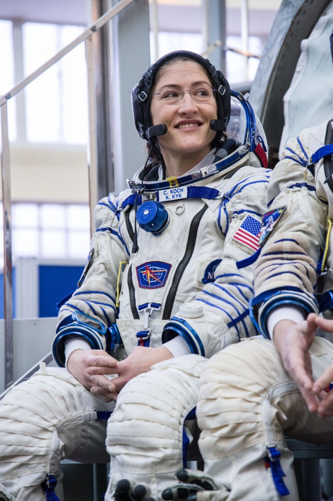 At the Gagarin Cosmonaut Training Center in Star City, Russia, Expedition 59 crew member Christina Koch of NASA listens to reporters’ questions in front of a Soyuz spacecraft simulator Feb. 20 during the second day of final pre-launch qualifications exams. Koch, Nick Hague of NASA and Alexey Ovchinin of Roscosmos will launch March 14, U.S. time, in the Soyuz MS-12 spacecraft from the Baikonur Cosmodrome in Kazakhstan for a six-and-a-half month mission on the International Space Station.