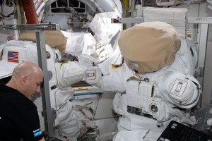 Commander Luca Parmitano of ESA (European Space Agency) works on U.S. spacesuits that he and NASA astronaut Andrew Morgan will wear on a spacewalk scheduled for Jan. 25. The duo will finalize thermal repairs on the Alpha Magnetic Spectrometer, an astrophysics device searching for evidence of dark matter and antimatter on the International Space Station's Starboard-3 truss structure.