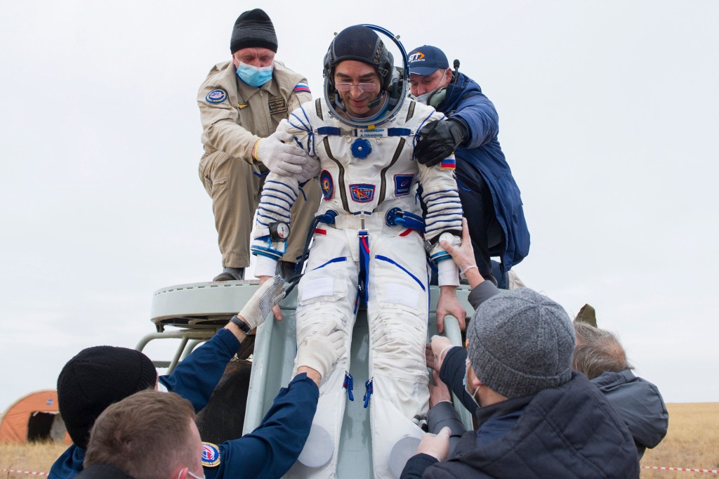 nhq202010220015 (Oct. 22, 2020) --- Expedition 63 Roscosmos cosmonaut Anatoly Ivanishin is helped out of the Soyuz MS-16 spacecraft just minutes after he, Roscosmos cosmonaut Ivan Vagner, and NASA astronaut Chris Cassidy, landed in a remote area near the town of Zhezkazgan, Kazakhstan on Thursday, October 22, 2020, Kazakh time (Oct. 21 Eastern time). Cassidy, Ivanishin and Vagner returned after 196 days in space having served as Expedition 62-63 crew members onboard the International Space Station.