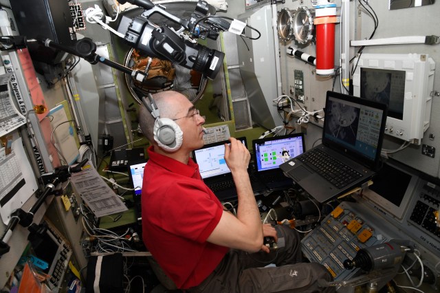 Roscosmos cosmonaut and Expedition 63 Flight Engineer Anatoly Ivanishin practices remote spacecraft maneuvering techniques on the Tele-Operated Robotics Unit (TORU) in the Zvezda service module. The TORU would be used in the unlikely event a Russian spacecraft would be unable to automatically rendezvous and dock to the International Space Station.