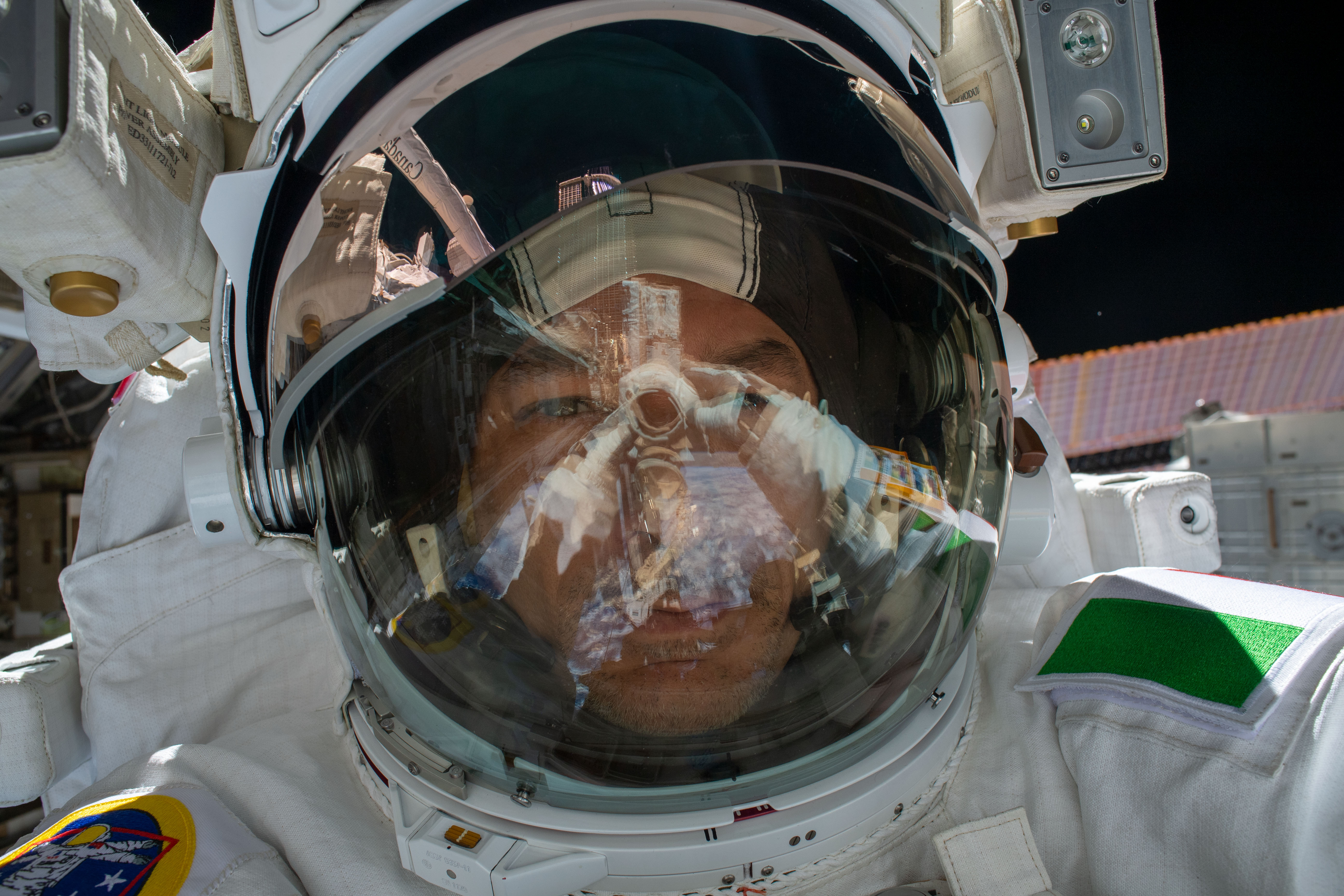 ESA (European Space Agency) astronaut Luca Parmitano takes an out-of-this-world "space-selfie" with his spacesuit's helmet visor up during the first spacewalk to repair the Alpha Magnetic Spectrometer, the International Space Station's cosmic particle detector.