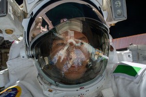 ESA (European Space Agency) astronaut Luca Parmitano takes an out-of-this-world "space-selfie" with his spacesuit's helmet visor up during the first spacewalk to repair the Alpha Magnetic Spectrometer, the International Space Station's cosmic particle detector.