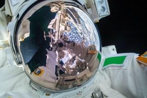 ESA (European Space Agency) astronaut Luca Parmitano takes an out-of-this-world "space-selfie" with his spacesuit's helmet visor down during the first spacewalk to repair the Alpha Magnetic Spectrometer, the International Space Station's cosmic particle detector.