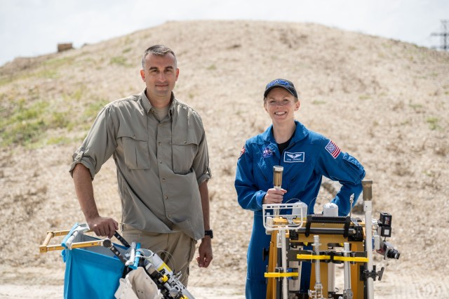 NASA Exploration Scientist Trevor Graff and NASA astronaut Zena Cardman at Johnson Space Center's lunar rock yard.