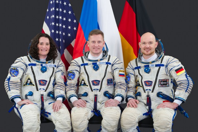 Expedition 56-57 crew members (from left) Serena Auñón-Chancellor of NASA, Sergey Prokopyev of Roscosmos and Alexander Gerst of ESA (European Space Agency) pose for a crew portrait in Sokol launch and entry suits at the Gagarin Cosmonaut Training Center in Star City, Russia.