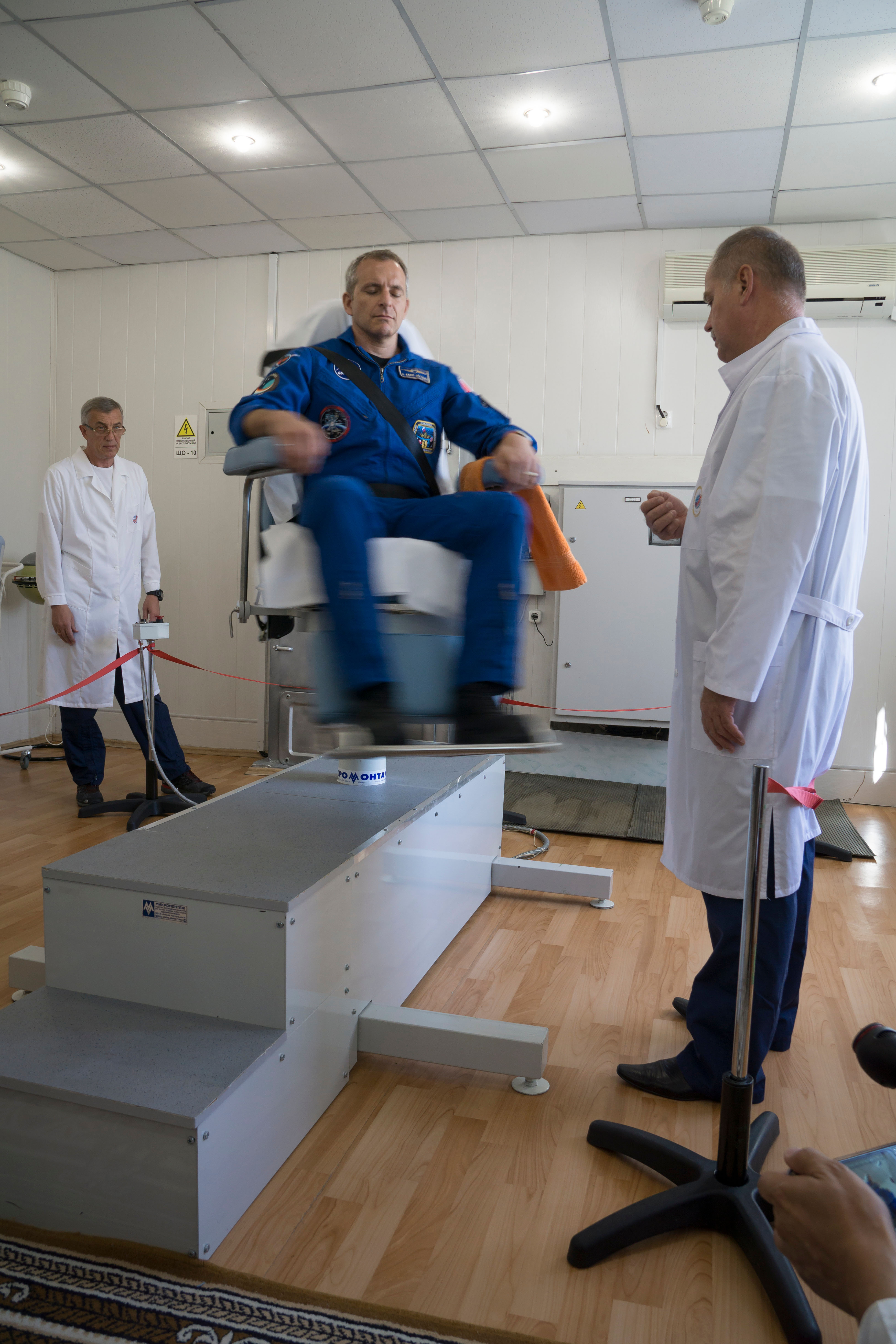 Expedition 57 backup crew member David Saint-Jacques of the Canadian Space Agency takes a spin in a rotating chair to test his vestibular system as part of pre-launch activities, Wednesday, Oct. 3, 2018 at the Cosmonaut Hotel in Baikonur, Kazakhstan. Alexey Ovchinin of Roscosmos and Nick Hague of NASA are scheduled to launch on Oct. 11 onboard the Soyuz MS-10 spacecraft from the Baikonur Cosmodrome in Kazakhstan for a six-month mission on the International Space Station.