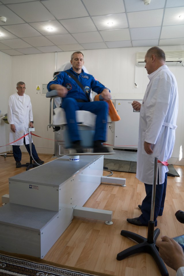 Expedition 57 backup crew member David Saint-Jacques of the Canadian Space Agency takes a spin in a rotating chair to test his vestibular system as part of pre-launch activities, Wednesday, Oct. 3, 2018 at the Cosmonaut Hotel in Baikonur, Kazakhstan. Alexey Ovchinin of Roscosmos and Nick Hague of NASA are scheduled to launch on Oct. 11 onboard the Soyuz MS-10 spacecraft from the Baikonur Cosmodrome in Kazakhstan for a six-month mission on the International Space Station.
