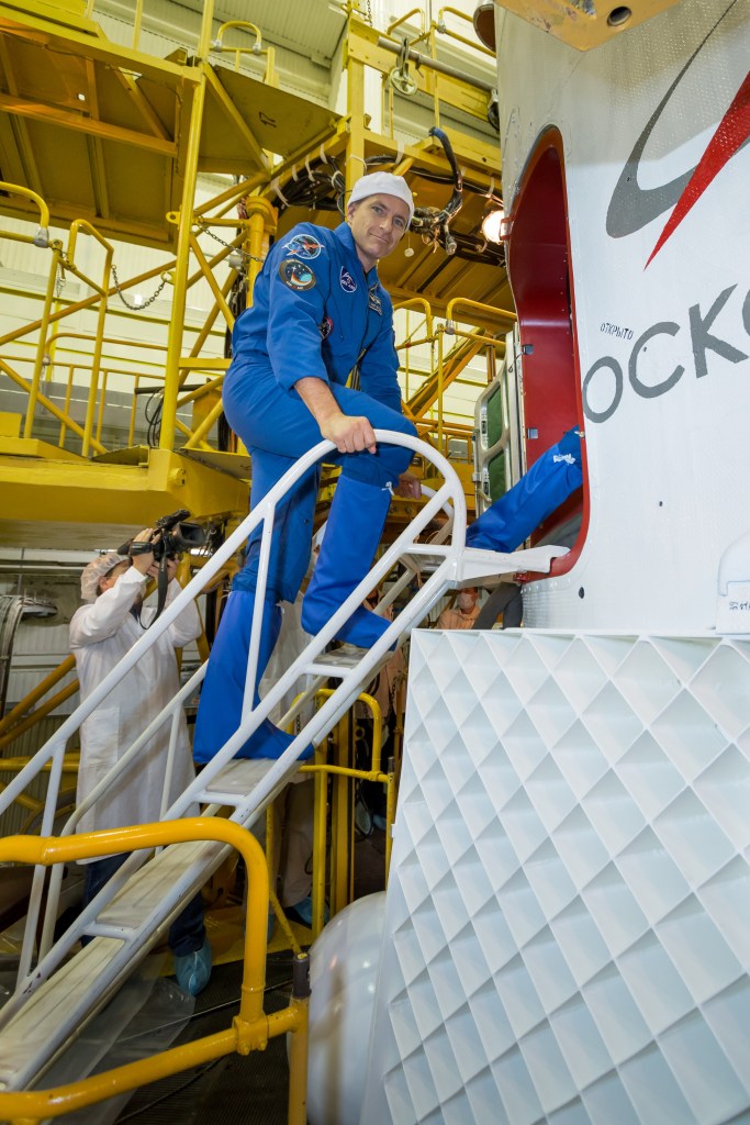 At the Baikonur Cosmodrome in Kazakhstan, Expedition 57 backup crewmember David Saint-Jacques of the Canadian Space Agency poses for pictures Oct. 6 as he boards the Soyuz MS-10 spacecraft for a final fit check. Saint-Jacques and Oleg Kononenko of Roscosmos are the backups to the prime crewmembers, Alexey Ovchinin of Roscosmos and Nick Hague of NASA, who will launch Oct. 11 from the Baikonur Cosmodrome on the Soyuz MS-10 spacecraft for a six-month mission on the International Space Station.