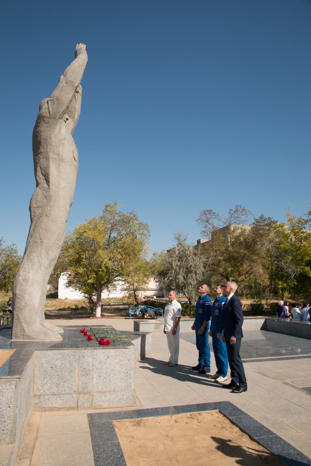 During a tour of the city of Baikonur, Kazakhstan, Expedition 57 backup crew members David Saint-Jacques of the Canadian Space Agency and Oleg Kononenko of Roscosmos pay homage to Yuri Gagarin, the first human to fly in space, as they laid flowers at his statue during traditional pre-launch ceremonies Sept. 27. They are the backups to the prime crew, Alexey Ovchinin of Roscosmos and Nick Hague of NASA, who will launch Oct. 11 on the Soyuz MS-10 spacecraft from the Baikonur Cosmodrome in Kazakhstan for a six-month mission on the International Space Station.