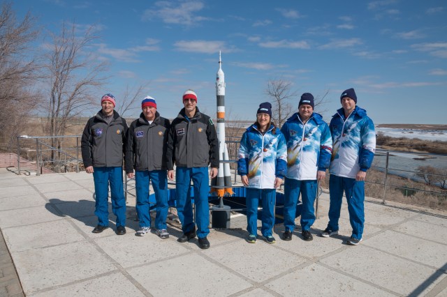 At the Cosmonaut Hotel crew quarters in Baikonur, Kazakhstan, the Expedition 59 backup and prime crew members pose for pictures March 7 as part of their pre-launch activities. From left to right are the backup crew members, Drew Morgan of NASA, Alexander Skvortsov of Roscosmos and Luca Parmitano of the European Space Agency, and the prime crew members, Christina Koch of NASA, Alexey Ovchinin of Roscosmos and Nick Hague of NASA. Hague, Ovchinin and Koch will launch March 14, U.S. time, on the Soyuz MS-12 spacecraft from the Baikonur Cosmodrome for a six-and-a-half month mission on the International Space Station.
