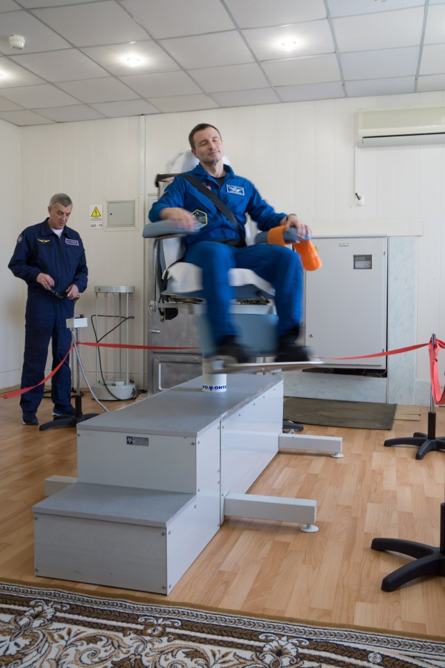 At the Cosmonaut Hotel crew quarters in Baikonur, Kazakhstan, Expedition 59 backup crew member Drew Morgan of NASA tests his vestibular system in a rotating chair March 7 as part of his pre-launch activities. Morgan, Luca Parmitano of the European Space Agency and Alexander Skvortsov of Roscosmos are the backups to the prime crewmembers, Christina Koch of NASA, Alexey Ovchinin of Roscosmos and Nick Hague of NASA, who will launch March 14, U.S. time, on the Soyuz MS-12 spacecraft from the Baikonur Cosmodrome for a six-and-a-half month mission on the International Space Station.