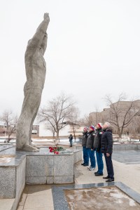 Joined by a local official in the town of Baikonur, Kazakhstan, Expedition 59 backup crew members Drew Morgan of NASA, Alexander Skvortsov of Roscosmos and Luca Parmitano of the European Space Agency participate in ceremonies at the statue of Yuri Gagarin, the first human to fly in space, as part of traditional pre-launch activities Feb. 28. They are the backups to Nick Hague and Christina Koch of NASA and Alexey Ovchinin of Roscosmos, who will launch March 14, U.S. time, in the Soyuz MS-12 spacecraft from the Baikonur Cosmodrome in Kazakhstan for a six-and-a-half month mission on the International Space Station.