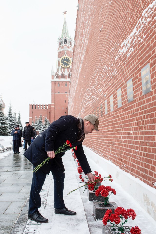 At the Kremlin Wall in Moscow, Expedition 59 crew member Alexey Ovchinin of Roscosmos lays flowers where Russian space icons are interred in traditional ceremonies Feb. 21. Ovchinin and Nick Hague and Christina Koch of NASA will launch March 14, U.S. time, on the Soyuz MS-12 spacecraft from the Baikonur Cosmodrome in Kazakhstan for a six-and-a-half month mission on the International Space Station.