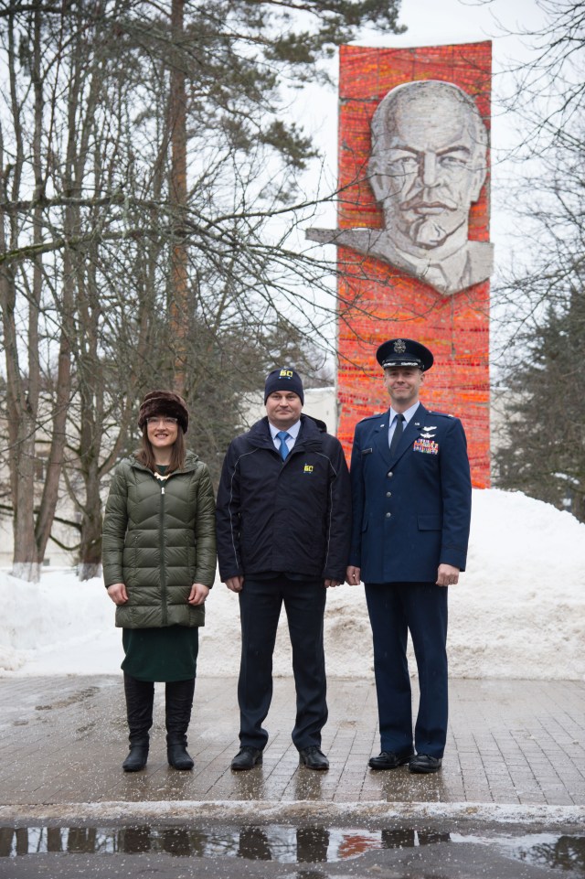 At the Gagarin Cosmonaut Training Center in Star City, Russia, Expedition 59 crew members Christina Koch of NASA (left), Alexey Ovchinin of Roscosmos (center) and Nick Hague of NASA (right) pose for pictures Feb. 26 in front of the statue of Vladimir Lenin as they prepared to depart for their launch site at the Baikonur Cosmodrome in Kazakhstan for final pre-launch training. They will launch on March 14, U.S. time, on the Soyuz MS-12 spacecraft from the Baikonur Cosmodrome in Kazakhstan for a six-and-a-half month mission on the International Space Station.