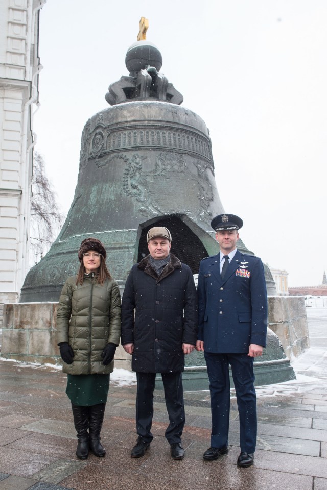 Inside the Kremlin in Moscow, Expedition 59 crew members Christina Koch of NASA (left), Alexey Ovchinin of Roscosmos (center) and Nick Hague of NASA (right) pose for pictures in front of the Tsar Bell on a wintry day Feb. 21 as part of their pre-launch activities. They will launch March 14, U.S. time, on the Soyuz MS-12 spacecraft from the Baikonur Cosmodrome in Kazakhstan for a six-and-a-half month mission on the International Space Station.