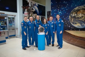 At the Baikonur Cosmodrome Museum in Kazakhstan, the Expedition 59 backup and prime crewmembers pose for pictures March 10 as part of traditional pre-launch activities. From left to right are the backup crew members, Drew Morgan of NASA, Alexander Skvortsov of Roscosmos and Luca Parmitano of the European Space Agency, and the prime crew members, Christina Koch of NASA, Alexey Ovchinin of Roscosmos and Nick Hague of NASA, who will launch March 14, U.S. time, in the Soyuz MS-12 spacecraft from the Baikonur Cosmodrome for a six-and-a-half month mission on the International Space Station.