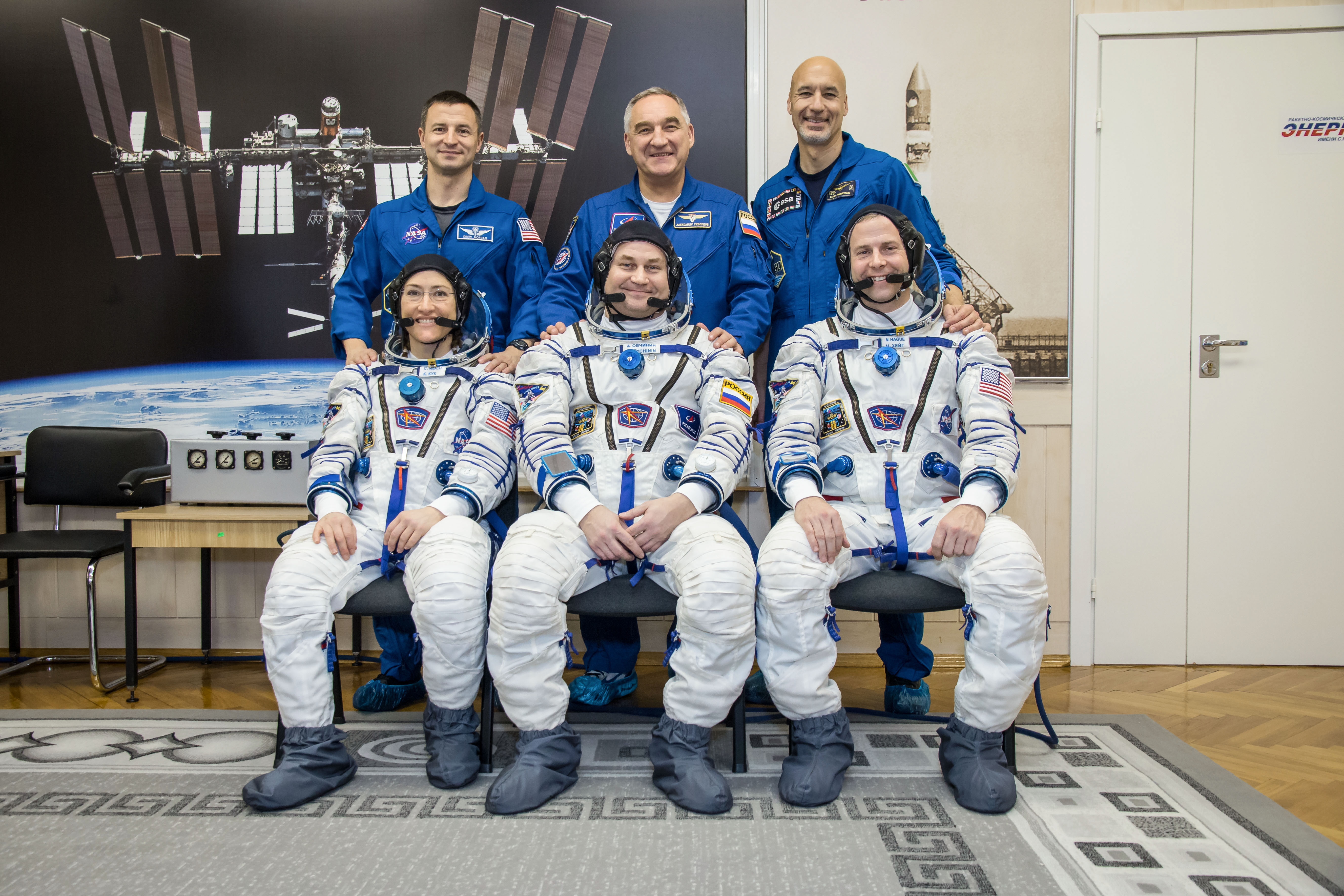 At the Baikonur Cosmodrome in Kazakhstan, the Expedition 59 prime and backup crew members pose for pictures Feb. 27 as part of their pre-launch training. In the front row are the prime crew members, Christina Koch of NASA, Alexey Ovchinin of Roscosmos and Nick Hague of NASA. In the back row are their backups, Drew Morgan of NASA, Alexander Skvortsov of Roscosmos and Luca Parmitano of the European Space Agency. Koch, Hague and Ovchinin will launch March 14, U.S. time, on the Soyuz MS-12 spacecraft from the Baikonur Cosmodrome in Kazakhstan for a six-and-a-half month mission on the International Space Station.