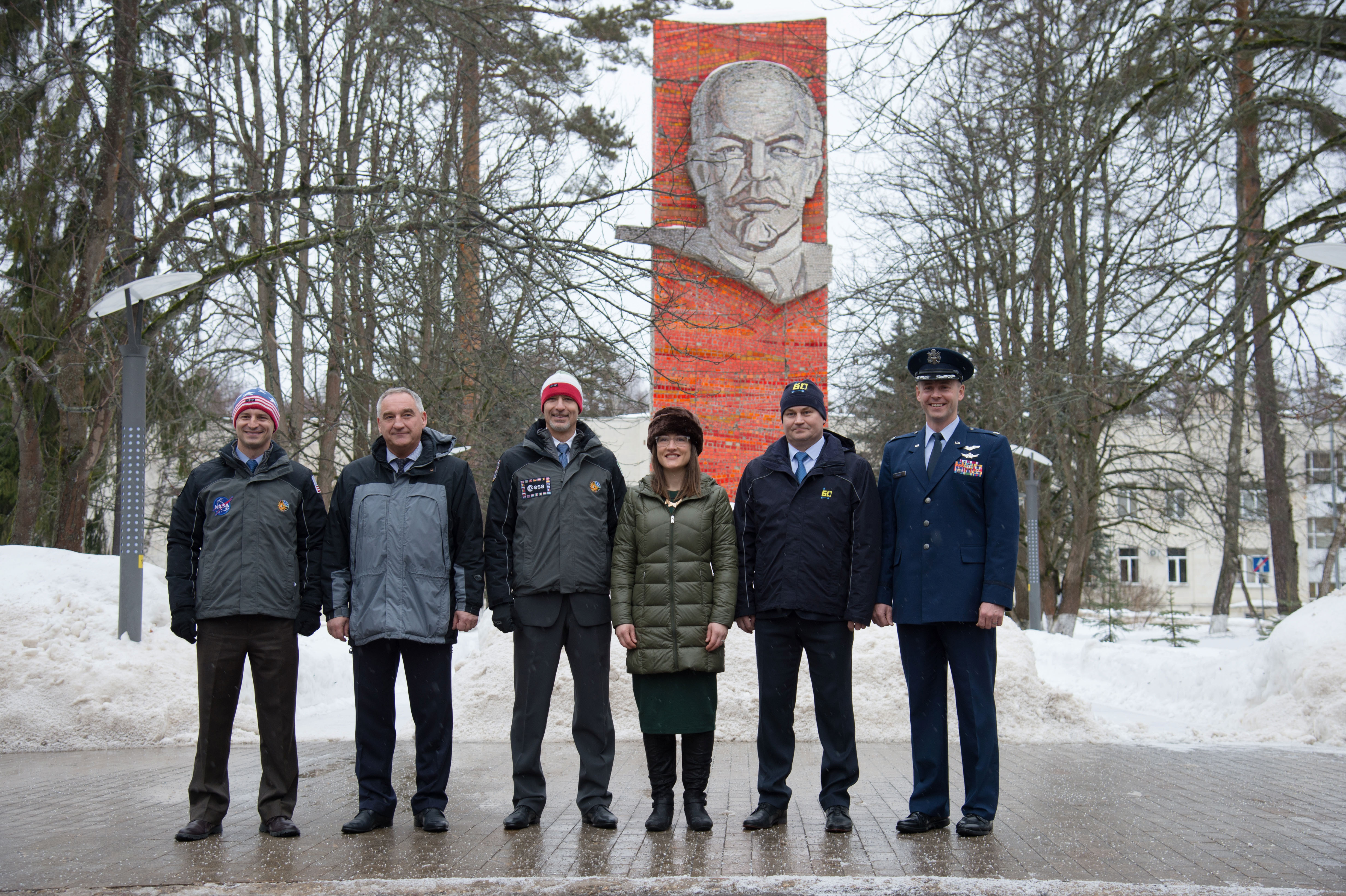 At the Gagarin Cosmonaut Training Center in Star City, Russia, the Expedition 59 prime and backup crew members pose for pictures Feb. 26 in front of the statue of Vladimir Lenin as they prepared to depart for their launch site at the Baikonur Cosmodrome in Kazakhstan for final pre-launch training. From left to right are the backup crew, Drew Morgan of NASA, Alexander Skvortsov of Roscosmos and Luca Parmitano of the European Space Agency, and the prime crew, Christina Koch of NASA, Alexey Ovchinin of Roscosmos and Nick Hague of NASA, who will launch on March 14, U.S. time, on the Soyuz MS-12 spacecraft from the Baikonur Cosmodrome in Kazakhstan for a six-and-a-half month mission on the International Space Station.