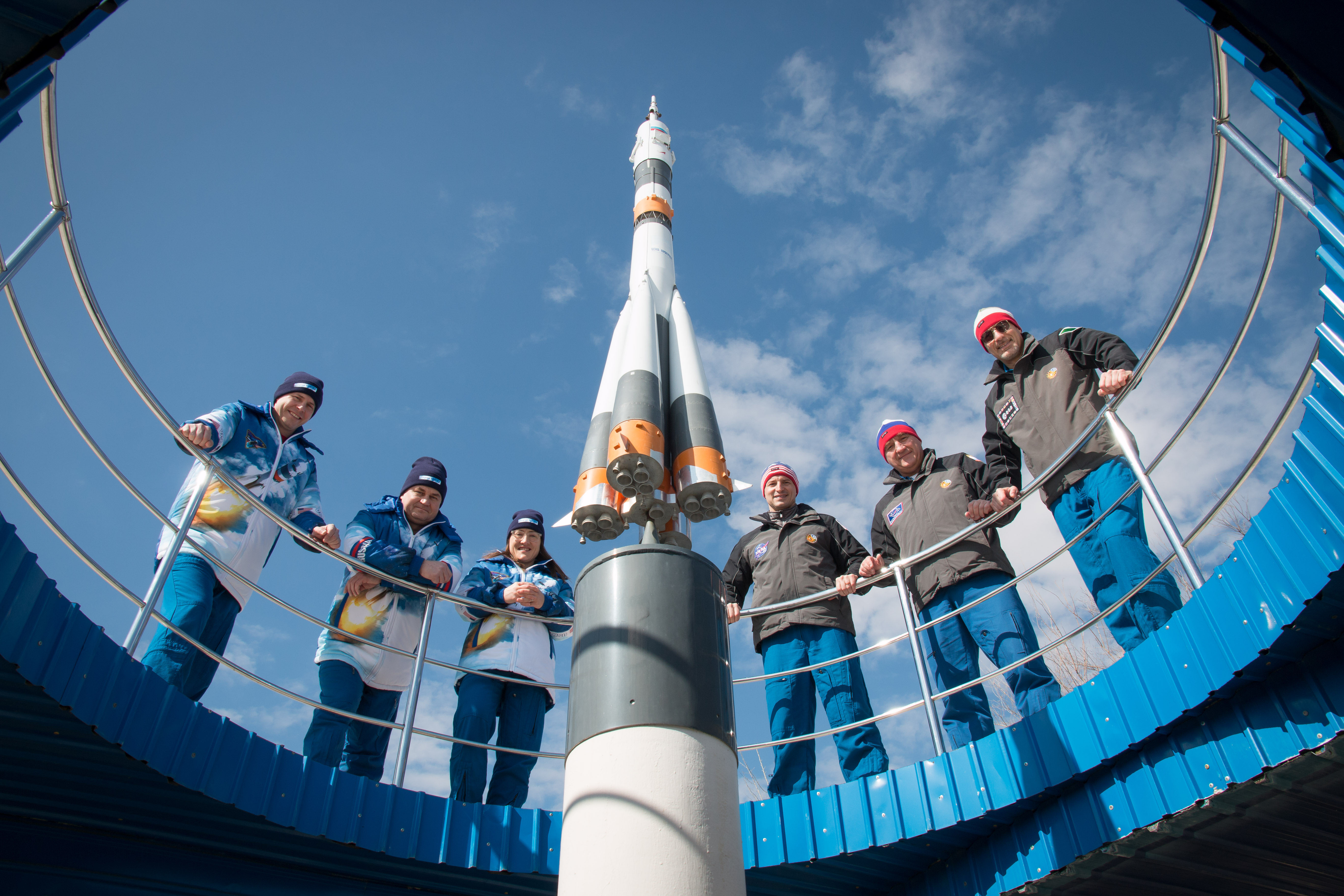 At the Cosmonaut Hotel crew quarters in Baikonur, Kazakhstan, the Expedition 59 prime and backup crew members pose for pictures March 7 as part of their pre-launch activities. From left to right are the prime crewmembers, Nick Hague of NASA, Alexey Ovchinin of Roscosmos and Christina Koch of NASA and the backup crewmembers, Drew Morgan of NASA, Alexander Skvortsov of Roscosmos and Luca Parmitano of the European Space Agency. Hague, Ovchinin and Koch will launch March 14, U.S. time, on the Soyuz MS-12 spacecraft from the Baikonur Cosmodrome for a six-and-a-half month mission on the International Space Station.