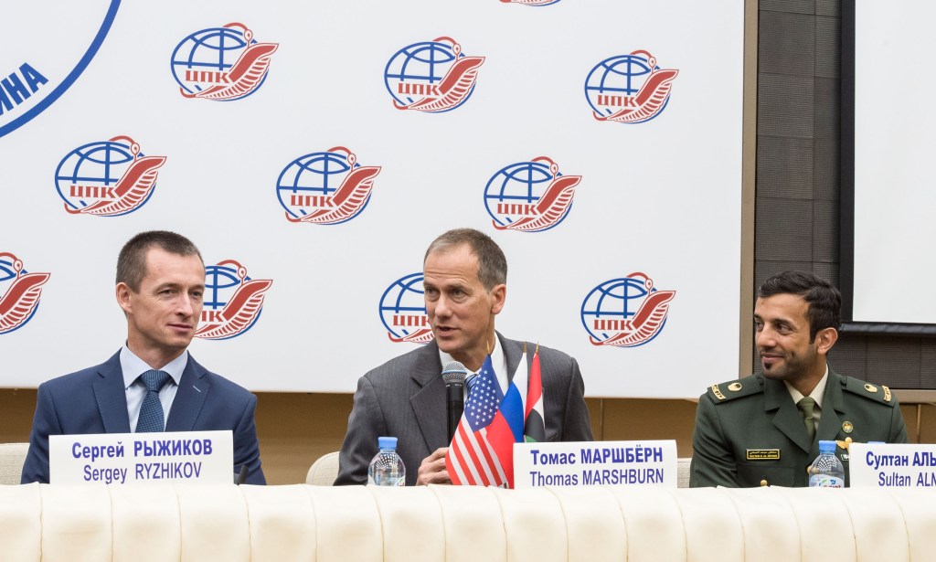 At the Gagarin Cosmonaut Training Center in Star City, Russia, Expedition 61 backup crewmembers Sergey Ryzhikov of Roscosmos (left), Tom Marshburn of NASA (center) and Sultan Al-Neyadi of the United Arab Emirates (right) answer reporters’ questions Sept. 5 as part of a pre-flight news conference. They are the backups to the prime crewmembers, Oleg Skripochka of Roscosmos, Jessica Meir of NASA and Hazzaa Ali Almansoori of the United Arab Emirates, who will launch Sept. 25 from the Baikonur Cosmodrome in Kazakhstan on the Soyuz MS-15 spacecraft for a mission on the International Space Station. Image: Gagarin Cosmonaut Training Center.