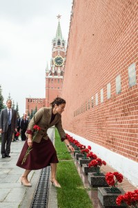 At the Kremlin Wall in Red Square in Moscow, Expedition 61 crewmember Jessica Meir of NASA lays flowers where Russian space icons are interred Sept. 5 as part of traditional pre-flight ceremonies. Meir, Oleg Skripochka of Roscosmos and spaceflight participant Hazzaa Ali Almansoori of the United Arab Emirates will launch Sept. 25 from the Baikonur Cosmodrome in Kazakhstan on the Soyuz MS-15 spacecraft for a mission on the International Space Station.