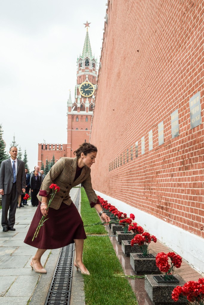 At the Kremlin Wall in Red Square in Moscow, Expedition 61 crewmember Jessica Meir of NASA lays flowers where Russian space icons are interred Sept. 5 as part of traditional pre-flight ceremonies. Meir, Oleg Skripochka of Roscosmos and spaceflight participant Hazzaa Ali Almansoori of the United Arab Emirates will launch Sept. 25 from the Baikonur Cosmodrome in Kazakhstan on the Soyuz MS-15 spacecraft for a mission on the International Space Station.