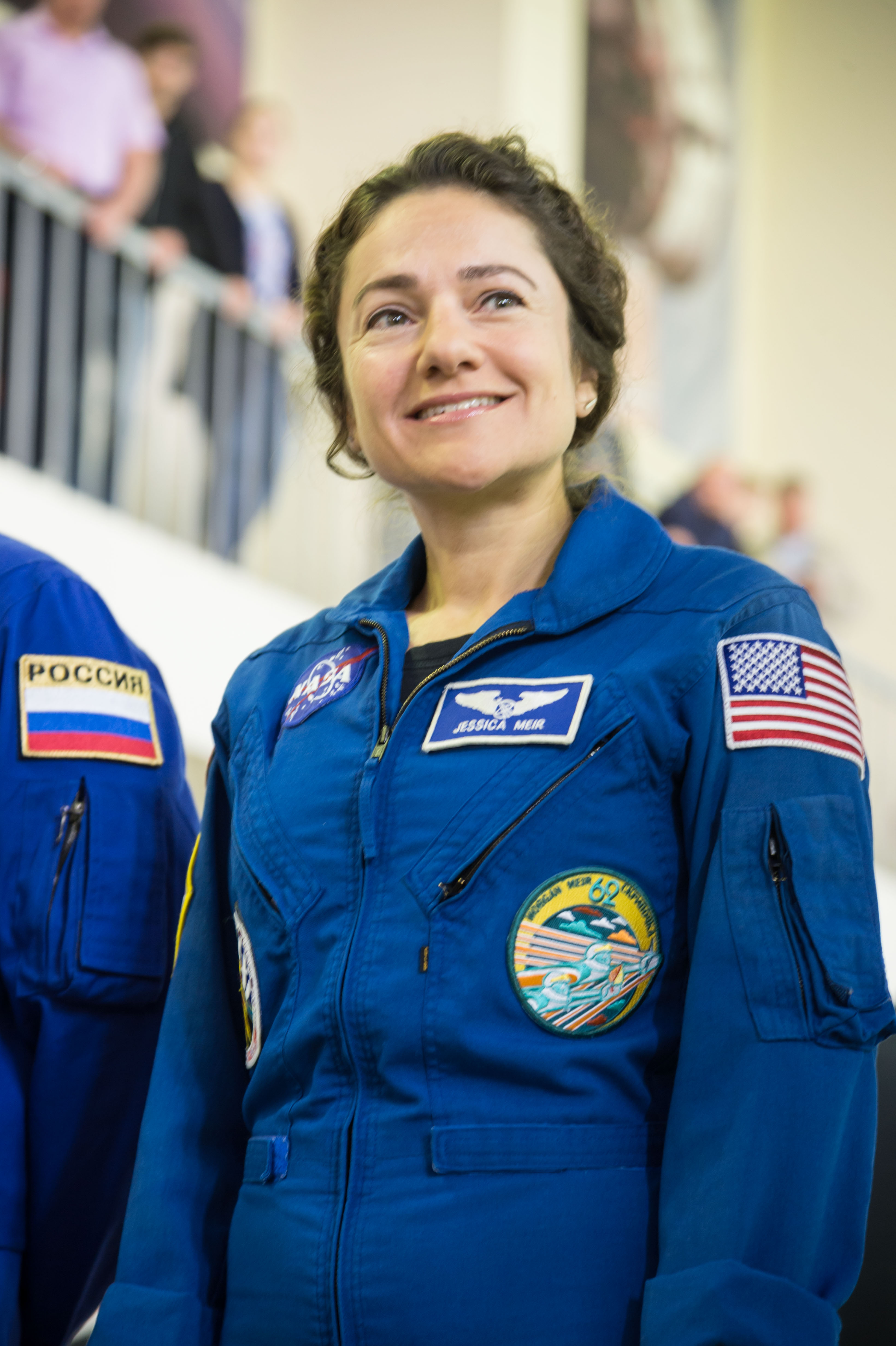 At the Gagarin Cosmonaut Training Center in Star City, Russia, Expedition 61 crewmember Jessica Meir of NASA listens to a reporter’s question Aug. 29 during the first day of the crew’s qualification exams for flight. Meir, Oleg Skripochka of Roscosmos and United Arab Emirates spaceflight participant Hazzaa Ali Almansoori will launch Sept. 25 from the Baikonur Cosmodrome in Kazakhstan on the Soyuz MS-15 spacecraft for a mission on the International Space Station.