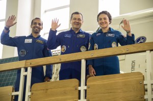 At the Gagarin Cosmonaut Training Center in Star City, Russia, the next crew to launch to the International Space Station posed for pictures Aug. 29 during their final qualification exams for flight. From left to right are United Arab Emirates spaceflight participant Hazzaa Ali Almansoori, and Expedition 61 crewmembers Oleg Skripochka of Roscosmos and Jessica Meir of NASA. They will launch Sept. 25 from the Baikonur Cosmodrome in Kazakhstan on the Soyuz MS-15 spacecraft.