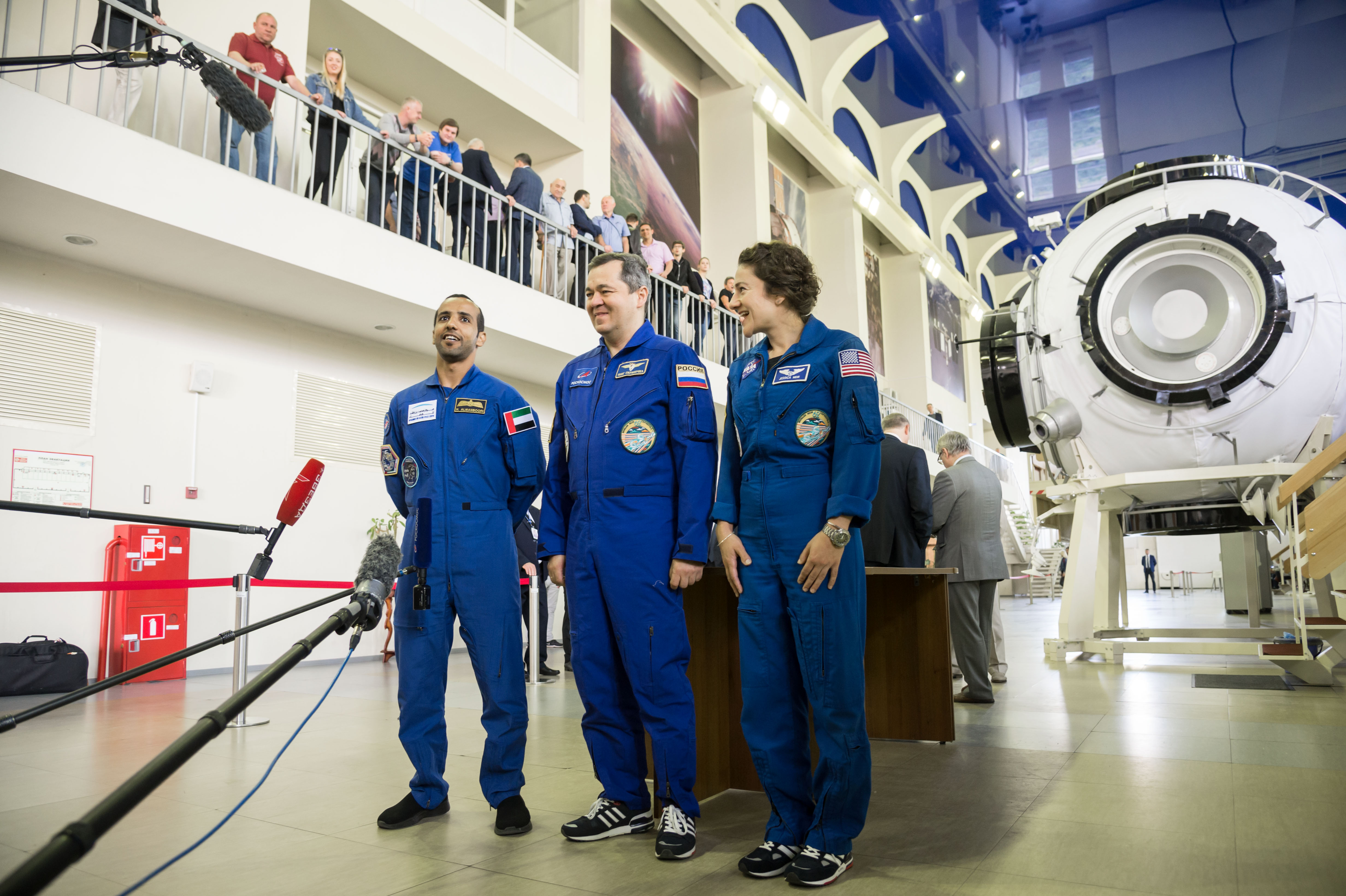 At the Gagarin Cosmonaut Training Center in Star City, Russia, the next crew to launch to the International Space Station responded to reporters’ questions Aug. 29 during their final qualification exams for flight. From left to right are United Arab Emirates spaceflight participant Hazzaa Ali Almansoori, and Expedition 61 crewmembers Oleg Skripochka of Roscosmos and Jessica Meir of NASA. They will launch Sept. 25 from the Baikonur Cosmodrome in Kazakhstan on the Soyuz MS-15 spacecraft.