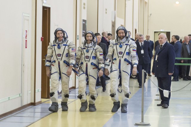 At the Gagarin Cosmonaut Training Center in Star City, Russia, Expedition 63 backup crewmembers Steve Bowen of NASA (left) and Sergey Ryzhikov (center) and Andrei Babkin of Roscosmos (right) arrive for Soyuz qualification exams March 11. They are the backups to Chris Cassidy of NASA and Anatoly Ivanishin and Ivan Vagner of Roscosmos, who are scheduled to launch April 9 in the Soyuz MS-16 spacecraft from the Baikonur Cosmodrome in Kazakhstan for a six-and-a-half month mission on the International Space Station.