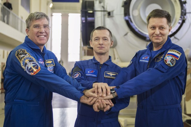 At the Gagarin Cosmonaut Training Center in Star City, Russia, Expedition 63 backup crewmembers Steve Bowen of NASA (left) and Sergey Ryzhikov (center) and Andrei Babkin (right) of Roscosmos pose for pictures March 12 during the second day of Soyuz qualification exams. They are the backups to Chris Cassidy of NASA and Anatoly Ivanishin and Ivan Vagner of Roscosmos who are scheduled to launch April 9 on the Soyuz MS-16 spacecraft from the Baikonur Cosmodrome in Kazakhstan for a six-and-a-half month mission on the International Space Station.