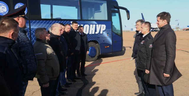 On the right, Expedition 63 backup crewmembers Steve Bowen of NASA and Sergey Ryzhikov and Andrei Babkin of Roscosmos meet with Russian space officials March 24 after arriving at the Baikonur Cosmodrome in Kazakhstan for final pre-launch preparations following a flight from their training base at the Gagarin Cosmonaut Training Center in Star City, Russia. They are the backups to the prime crewmembers, Chris Cassidy of NASA and Anatoly Ivanishin and Ivan Vagner of Roscosmos, who will launch April 9 on the Soyuz MS-16 spacecraft from the Baikonur Cosmodrome for a six-and-a-half month mission on the International Space Station.