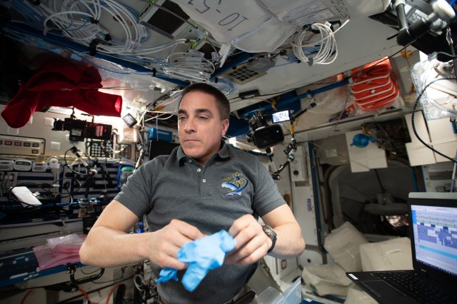 NASA astronaut and Expedition 63 Commander Chris Cassidy works inside the International Space Station's Harmony module conducting research activities to benefit humans living on and off the Earth.