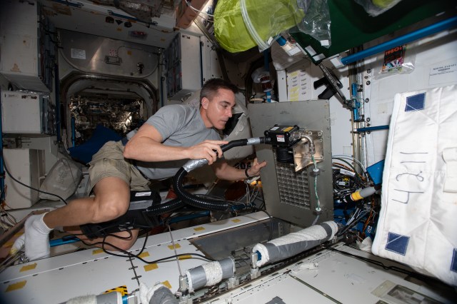 NASA astronaut and Expedition 63 Commander Chris Cassidy performs household chores and cleans life support gear aboard the International Space Station.