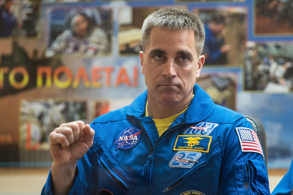 At the Cosmonaut Hotel crew quarters in Baikonur, Kazakhstan, Expedition 63 crewmember Chris Cassidy of NASA provides a fist pump April 8 responding to questions provided by reporters in a virtual question and answer session as he prepares for launch. Cassidy and Anatoly Ivanishin and Ivan Vagner of Roscosmos will launch April 9 on the Soyuz MS-16 spacecraft from the Baikonur Cosmodrome for a six-and-a-half month mission on the International Space Station.