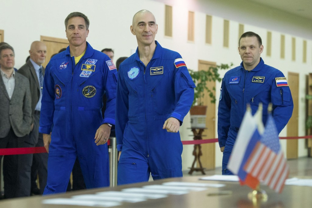 At the Gagarin Cosmonaut Training Center in Star City, Russia, Expedition 63 crewmembers Chris Cassidy of NASA (left) and Anatoly Ivanishin (center) and Ivan Vagner (right) of Roscosmos arrive for Soyuz qualification exams March 11 in advance of their scheduled launch April 9 in the Soyuz MS-16 spacecraft from the Baikonur Cosmodrome in Kazakhstan for a six-and-a-half month mission on the International Space Station.