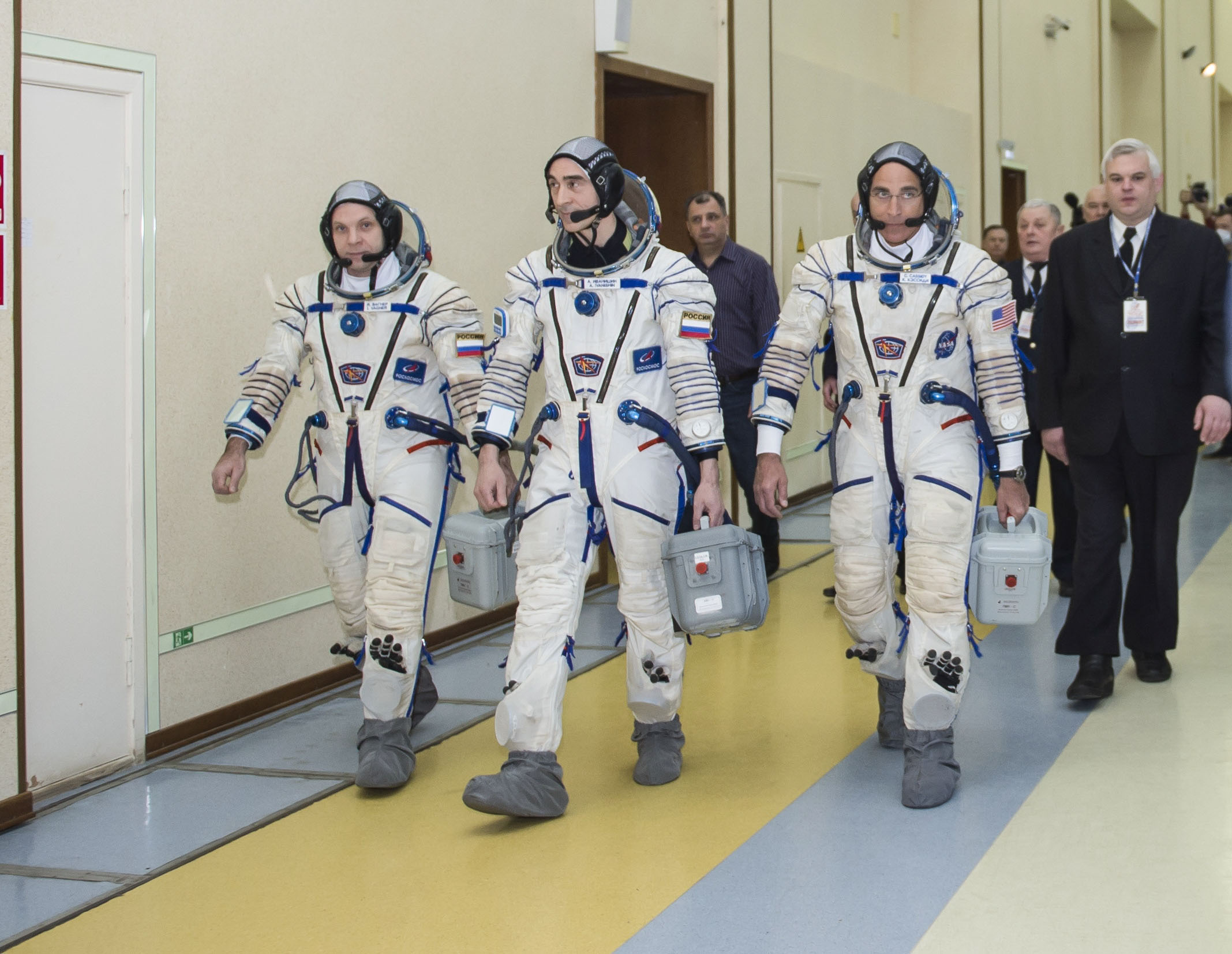 At the Gagarin Cosmonaut Training Center in Star City, Russia, Expedition 63 crewmembers Chris Cassidy of NASA (left) and Anatoly Ivanishin (center) and Ivan Vagner of Roscosmos (right) arrive for the second day of Soyuz qualification exams March 12. They are scheduled to launch April 9 on the Soyuz MS-16 spacecraft from the Baikonur Cosmodrome in Kazakhstan for a six-and-a-half month mission on the International Space Station.