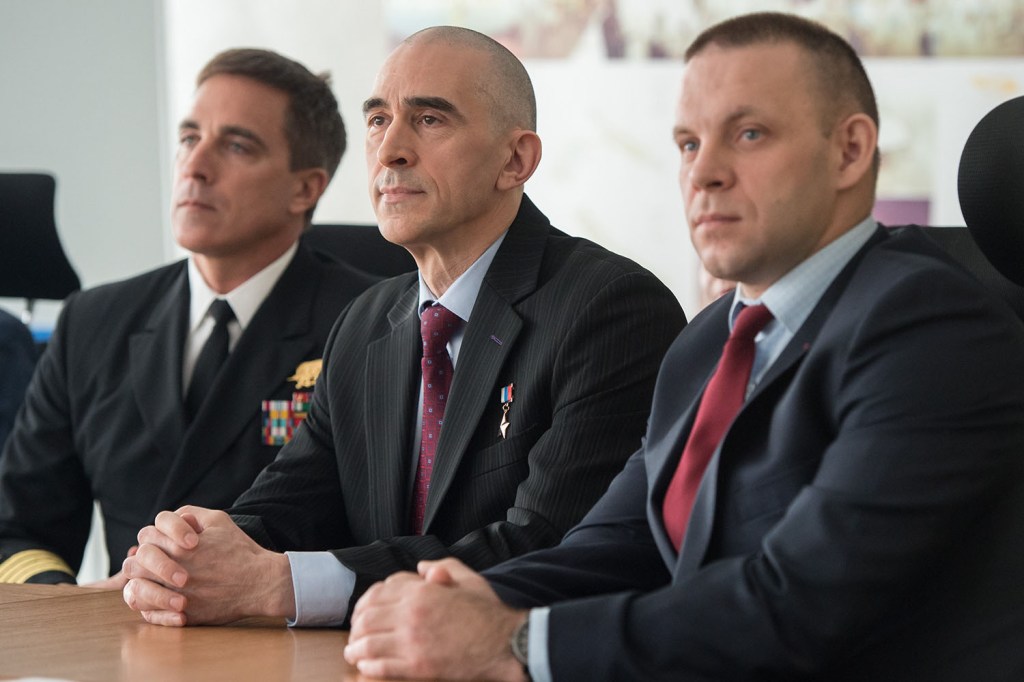 At the Gagarin Cosmonaut Training Center in Star City, Russia, Expedition 63 crewmembers Chris Cassidy of NASA (left) and Anatoly Ivanishin (center) and Ivan Vagner of Roscosmos (right) listen as the Russian State Commission approves them for launch March 23 on the eve of their departure for their launch site at the Baikonur Cosmodrome in Kazakhstan. Cassidy, Ivanishin and Vagner will launch April 9 on the Soyuz MS-16 spacecraft from Baikonur for a six-and-a-half month mission on the International Space Station.