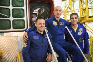 At the Baikonur Cosmodrome in Kazakhstan, Expedition 63 crewmembers Ivan Vagner (left) and Anatoly Ivanishin (center) of Roscosmos and Chris Cassidy (right) of NASA pose for pictures April 3 in front of their Soyuz spacecraft as part of their pre-launch activities. They will launch April 9 on the Soyuz MS-16 spacecraft from Baikonur on April 9 for a six-and-a-half month mission on the International Space Station.