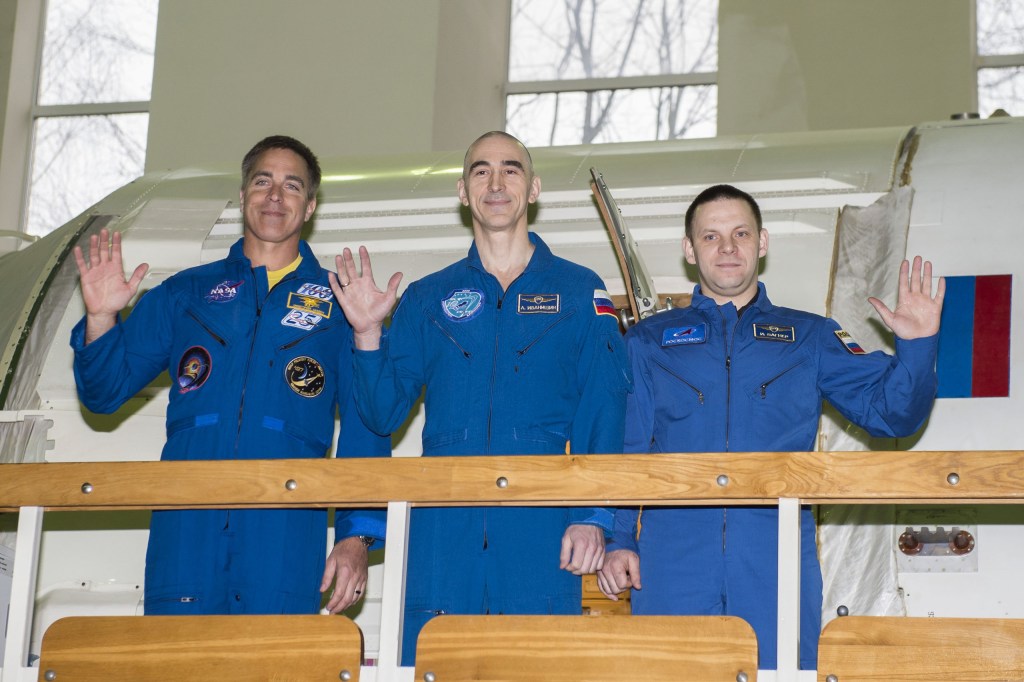At the Gagarin Cosmonaut Training Center in Star City, Russia, Expedition 63 crewmembers Chris Cassidy of NASA (left) and Anatoly Ivanishin (center) and Ivan Vagner (right) of Roscosmos wave to reporters March 11 during crew qualification exams in advance of their scheduled launch April 9 in the Soyuz MS-16 spacecraft from the Baikonur Cosmodrome in Kazakhstan for a six-and-a-half month mission on the International Space Station.