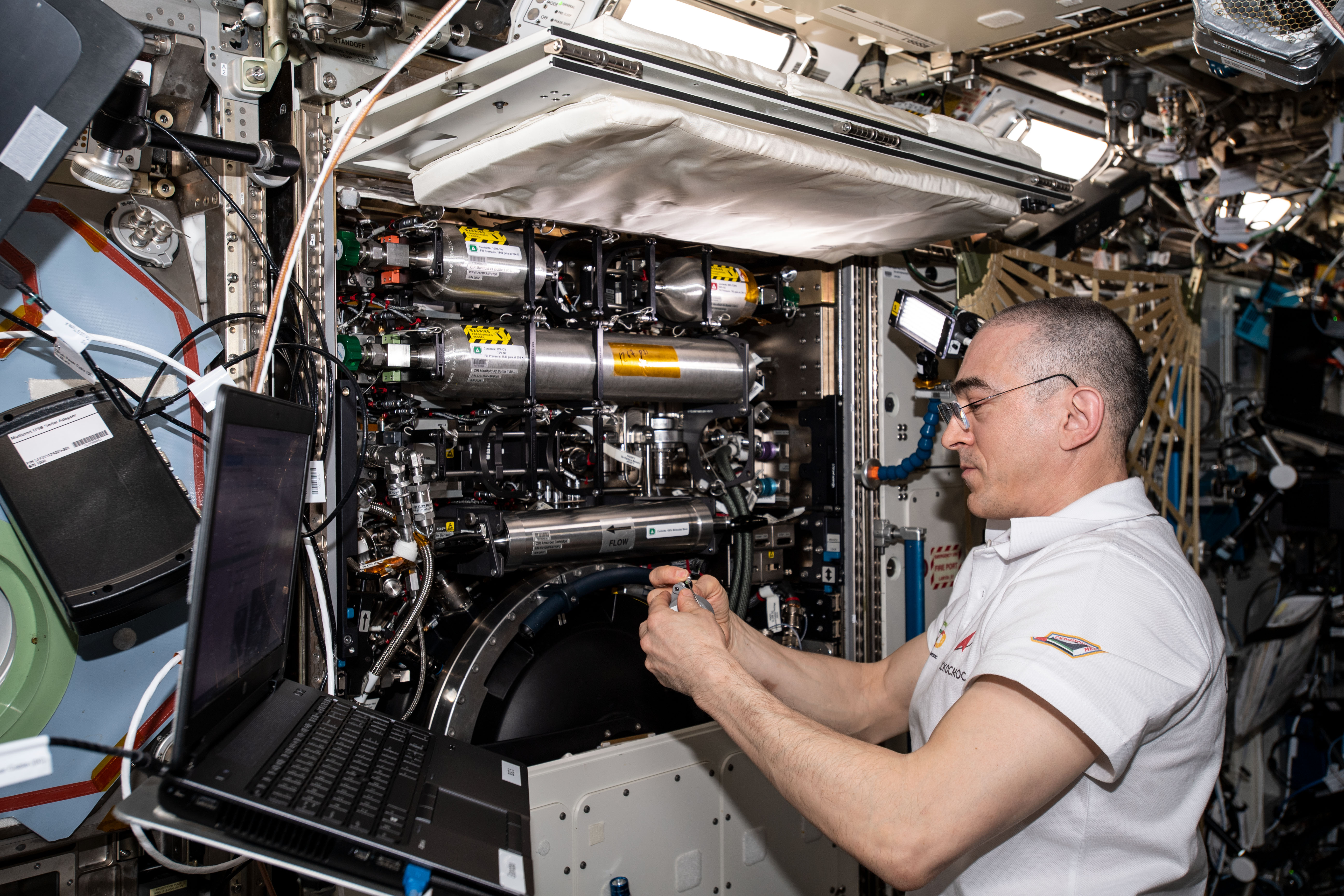 Roscosmos cosmonaut and Expedition 63 Flight Engineer Anatoly Ivanishin services components and replaces fuel bottles inside the Combustion Integrated Rack (CIR). The CIR is a research device that enables safe fuel, flame and soot studies in microgravity.