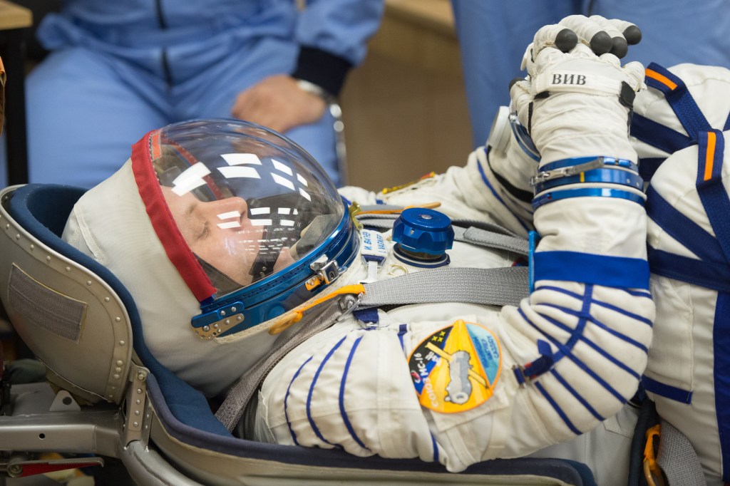 Expedition 63 crewmember Ivan Vagner of Roscosmos has his Sokol suit pressure checked ahead of his launch on a Soyuz rocket with Anatoly Ivanishin of Roscosmos, and Chris Cassidy of NASA, Thursday, April 9, 2020 at the Baikonur Cosmodrome in Kazakhstan. A few hours later, Vagner, Anatoly Ivanishin of Roscosmos, and Chris Cassidy of NASA lifted off for a six-and-a-half month mission on the International Space Station.