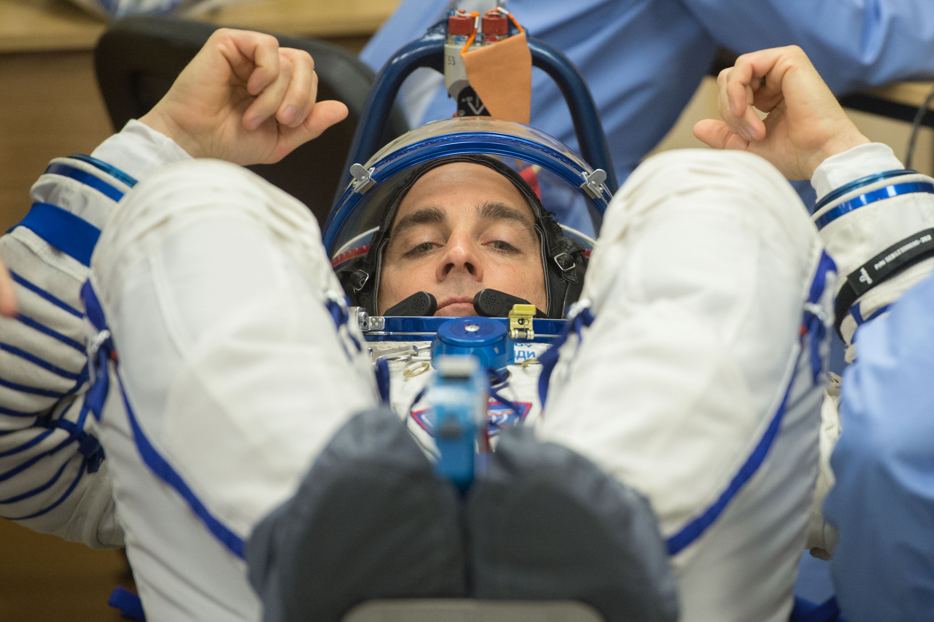 Expedition 63 crewmember Chris Cassidy of NASA has his Sokol suit pressure checked ahead of his launch on a Soyuz rocket with Anatoly Ivanishin and Ivan Vagner of Roscosmos, Thursday, April 9, 2020 at the Baikonur Cosmodrome in Kazakhstan. A few hours later, Vagner, Anatoly Ivanishin of Roscosmos, and Chris Cassidy of NASA lifted off for a six-and-a-half month mission on the International Space Station.