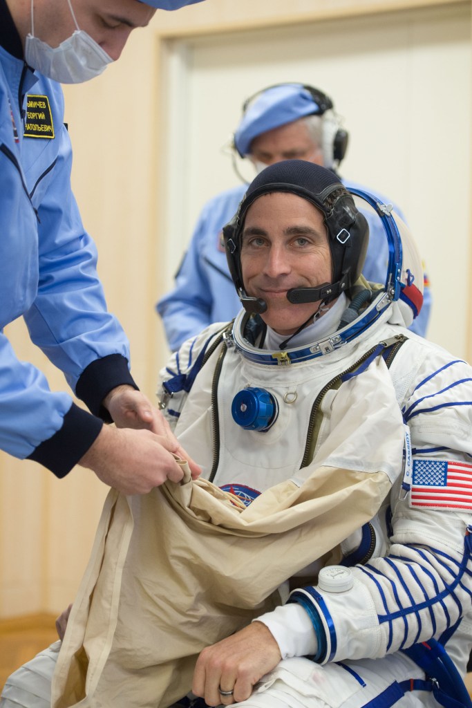 Expedition 63 crewmember Chris Cassidy of NASA dons his Sokol suit a few hours ahead of his launch on a Soyuz rocket with Ivan Vagner and Anatoly Ivanishin of Roscosmos, Thursday, April 9, 2020 at the Baikonur Cosmodrome in Kazakhstan. A few hours later, they lifted off for a six-and-a-half month mission on the International Space Station.