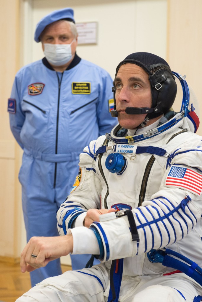 Expedition 63 crewmember Chris Cassidy of NASA dons his Sokol suit a few hours ahead of his launch on a Soyuz rocket with Ivan Vagner and Anatoly Ivanishin of Roscosmos, Thursday, April 9, 2020 at the Baikonur Cosmodrome in Kazakhstan. A few hours later, they lifted off for a six-and-a-half month mission on the International Space Station.