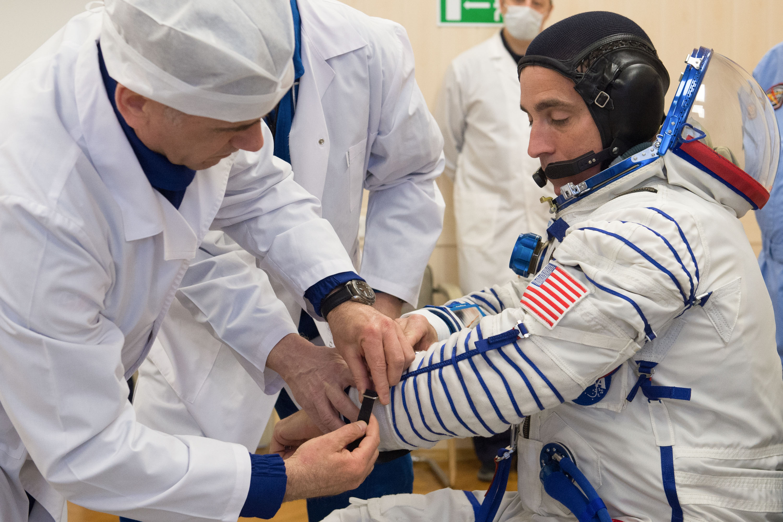 Expedition 63 crewmember Chris Cassidy of NASA dons his Sokol suit a few hours ahead of his launch on a Soyuz rocket with Ivan Vagner and Anatoly Ivanishin of Roscosmos, Thursday, April 9, 2020 at the Baikonur Cosmodrome in Kazakhstan. A few hours later, they lifted off for a six-and-a-half month mission on the International Space Station.