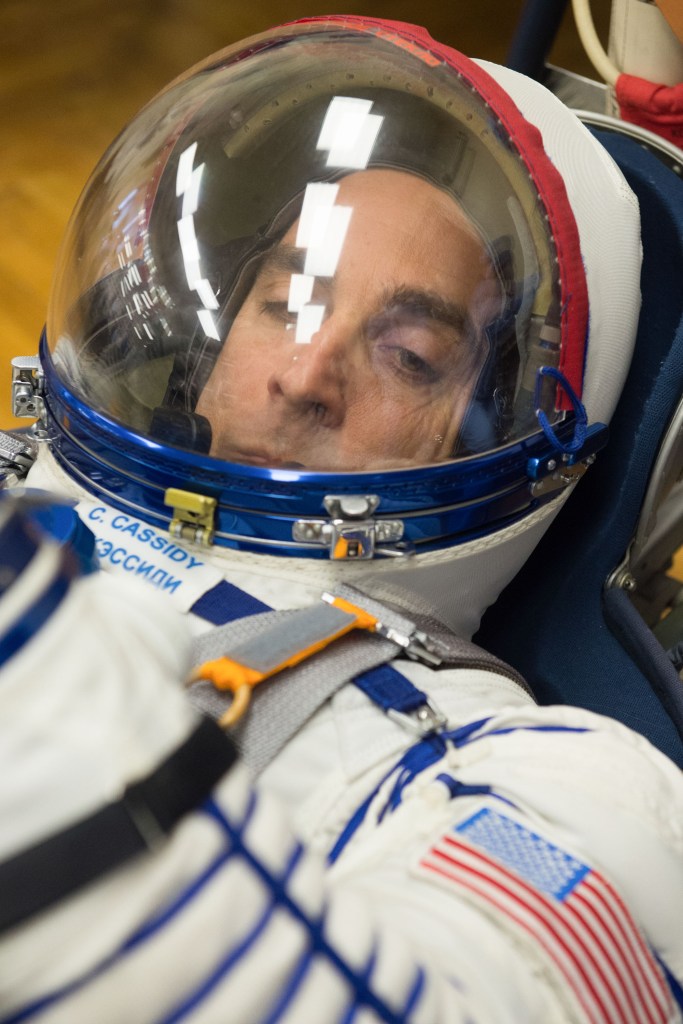 Expedition 63 crewmember Chris Cassidy of NASA has his Sokol suit pressure checked ahead of his launch on a Soyuz rocket with Anatoly Ivanishin and Ivan Vagner of Roscosmos, Thursday, April 9, 2020 at the Baikonur Cosmodrome in Kazakhstan. A few hours later, Vagner, Anatoly Ivanishin of Roscosmos, and Chris Cassidy of NASA lifted off for a six-and-a-half month mission on the International Space Station.