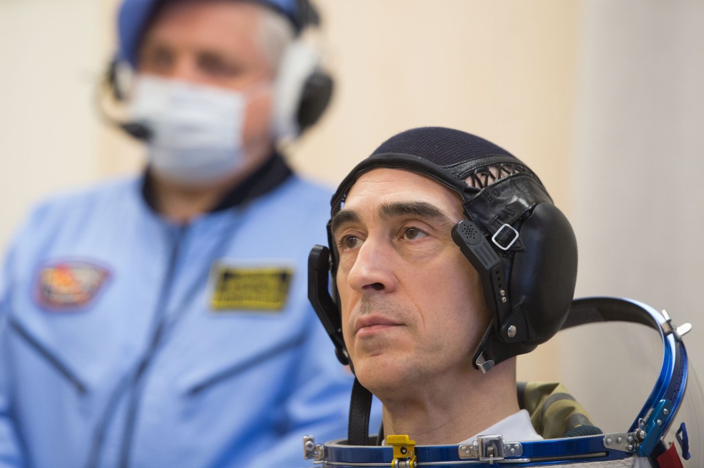 Expedition 63 crewmember Anatoly Ivanishin of Roscosmos dons his Sokol suit a few hours ahead of his launch on a Soyuz rocket with Ivan Vagner of Roscosmos, and Chris Cassidy of NASA, Thursday, April 9, 2020 at the Baikonur Cosmodrome in Kazakhstan. A few hours later, they lifted off for a six-and-a-half month mission on the International Space Station.